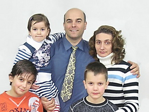 Pastor of the church with his family